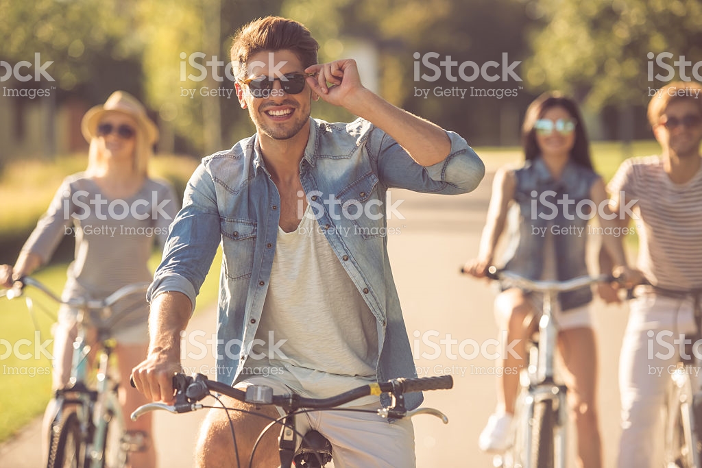 four people biking