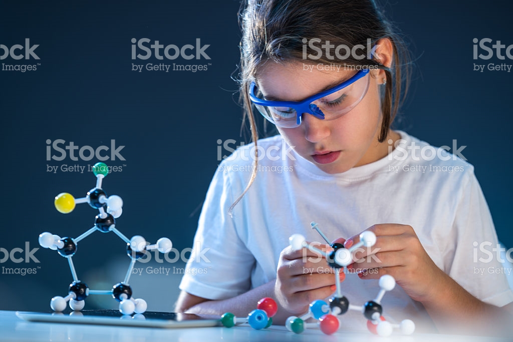 Girl with goggles and molecules