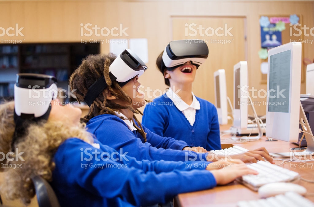 Three kids with VR glasses